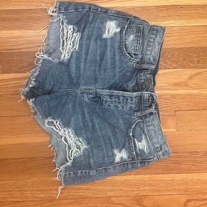 Fun summer Jean shorts from the brand Hidden, has pretty neon colors in the rips